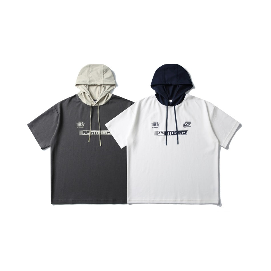 Two short-sleeve hoodies shown from the front: charcoal with a light hood and white with a navy hood.