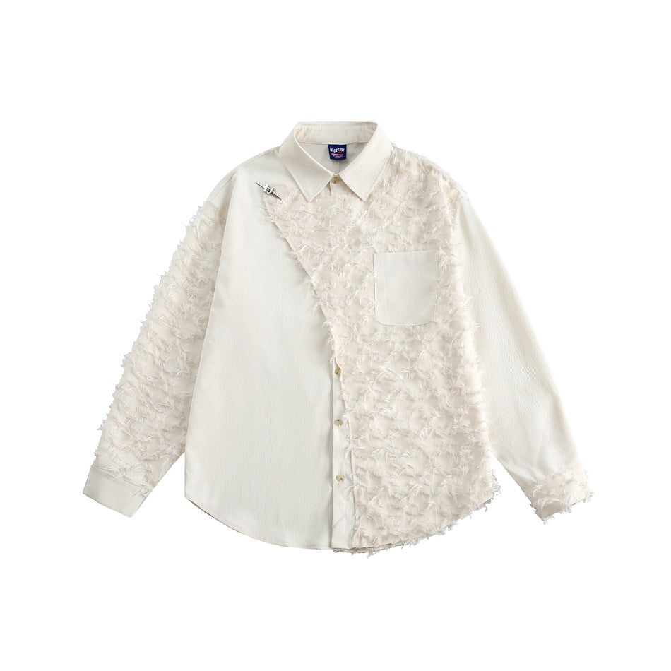 Off-white long-sleeve shirt with a frayed fringe panel on one side, a chest pocket and a small metal pin at the collar