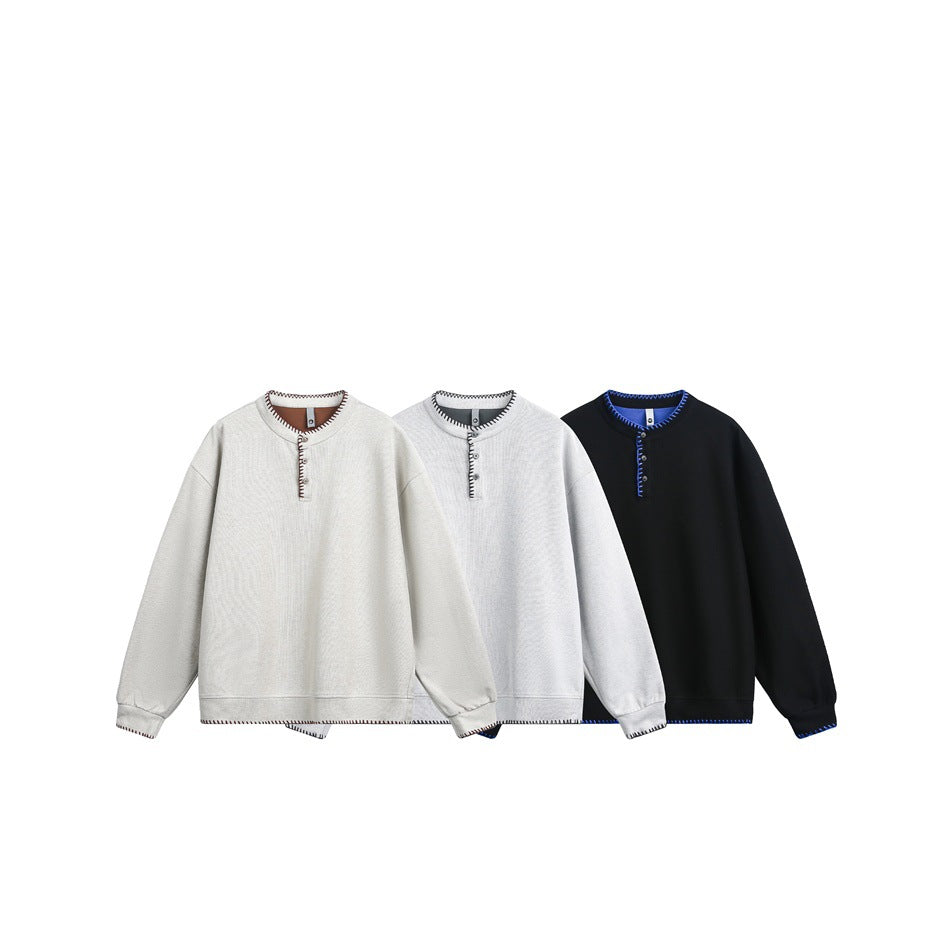 Three pullover colorways shown together: cream with brown stitching, pale gray with dark stitching, and black with blue