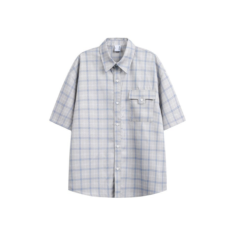 Light gray short-sleeve button-up shirt with blue plaid pattern, pointed collar and flap chest pocket, front view