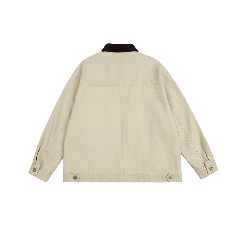 Back view of a light beige jacket with a dark brown collar, center seam and buttoned cuffs and hem tabs.