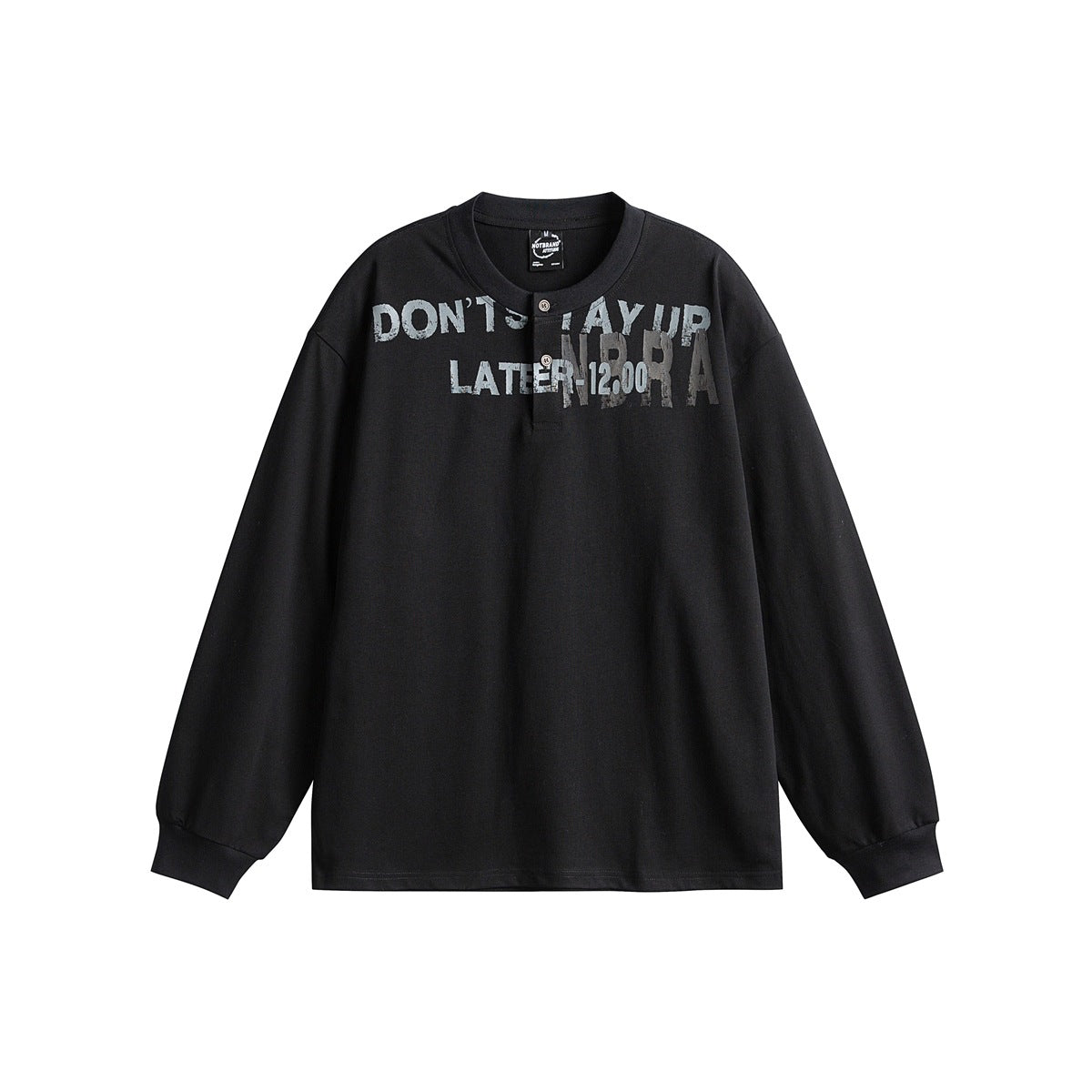 Black long-sleeve Henley tee with two-button placket, ribbed cuffs and gray distressed lettering print, flat lay