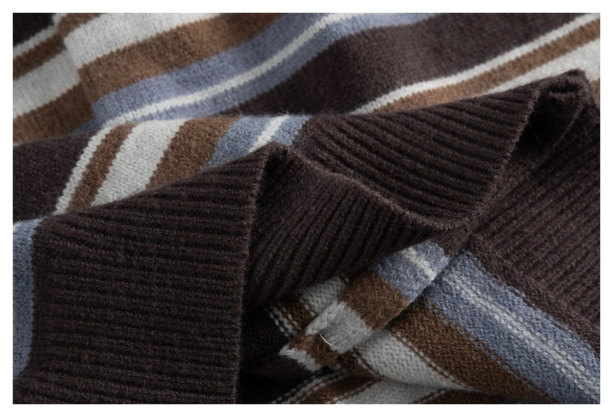 Close-up of the cardigan's dark brown ribbed cuff and striped knit sleeve.