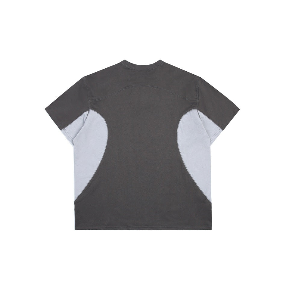 Back of a charcoal short-sleeve shirt with curved light gray side panels.