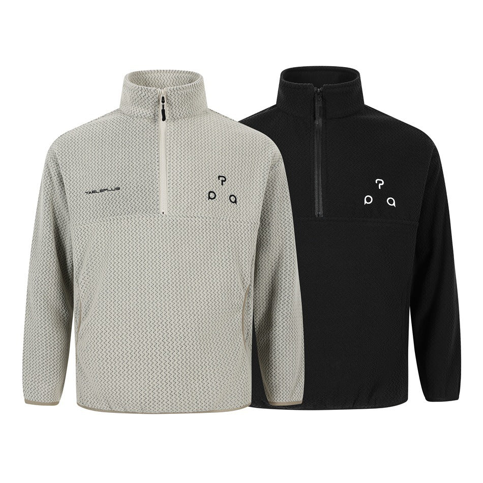 Two quarter-zip stand-collar pullovers shown from the front: one cream with a gray zigzag pattern and one black.
