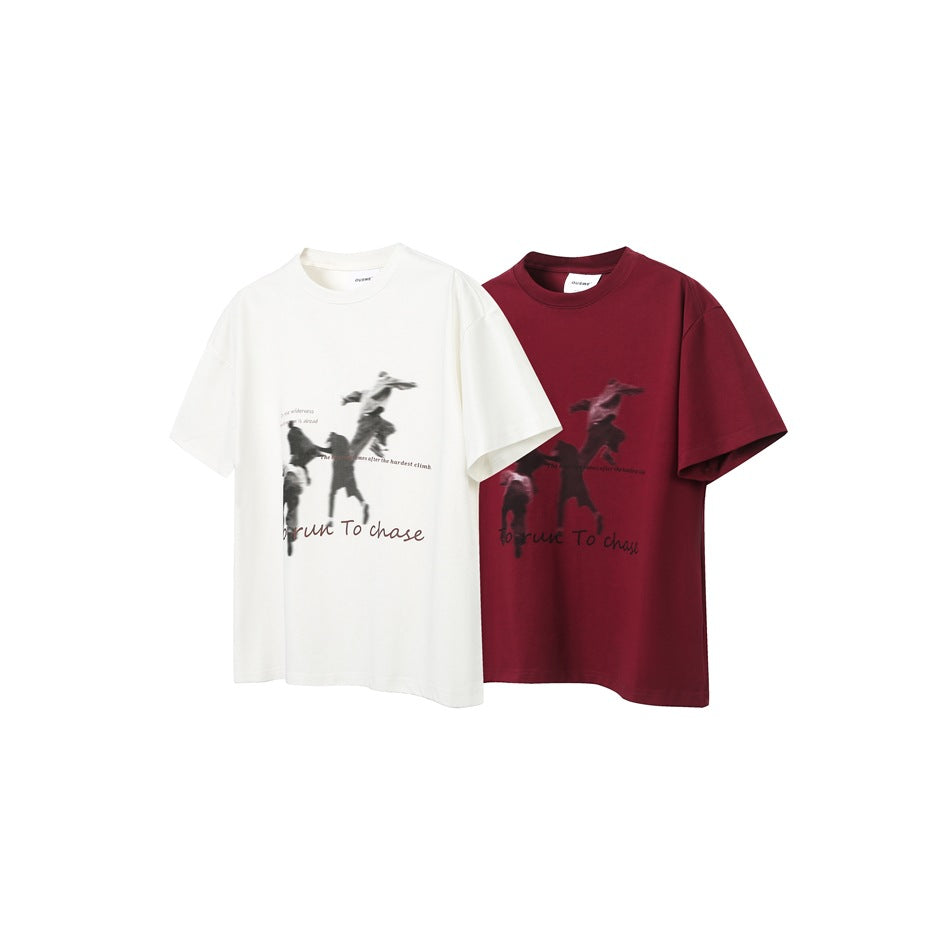 Off-white and burgundy crew-neck T-shirts with matching blurred figure graphics and English text, shown flat.