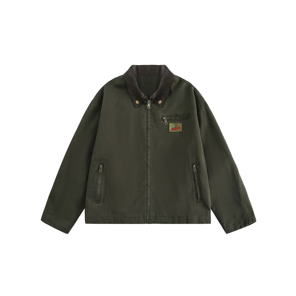 Army green zip-front jacket with a dark leather-look collar, chest zip pocket, small patch and zippered side pockets