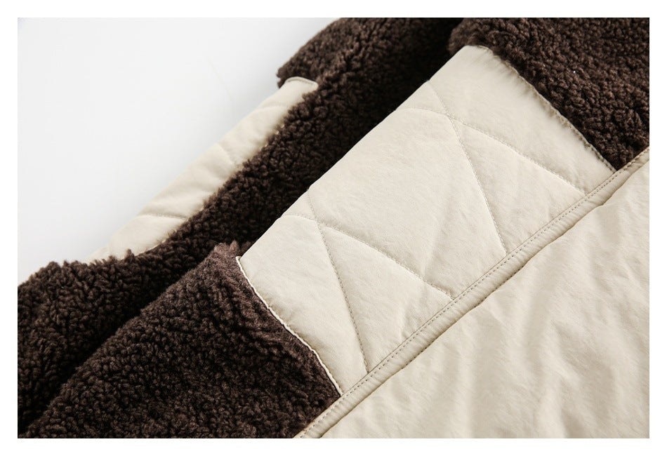 Close-up of a cream diamond-stitched panel bordered by dark brown curly fleece.