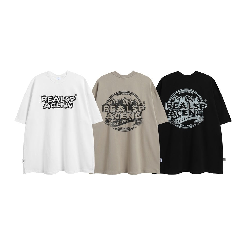 Three oversized graphic T-shirts shown together in white, taupe and black colorways.
