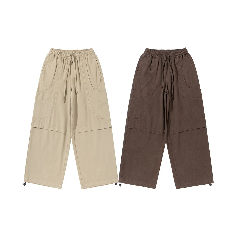 Two pairs of wide-leg cargo pants shown from the front in light beige and dark brown, with elastic waists and drawcord hems.
