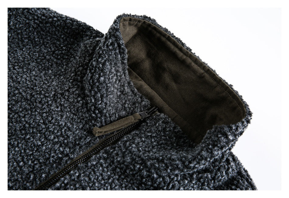Close-up of the charcoal textured jacket's lined collar and zipper.