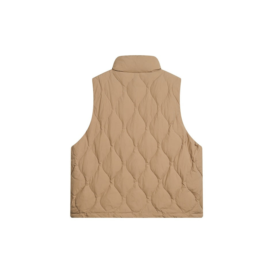 Back view of tan quilted stand-collar vest with wavy leaf-shaped quilting on white background