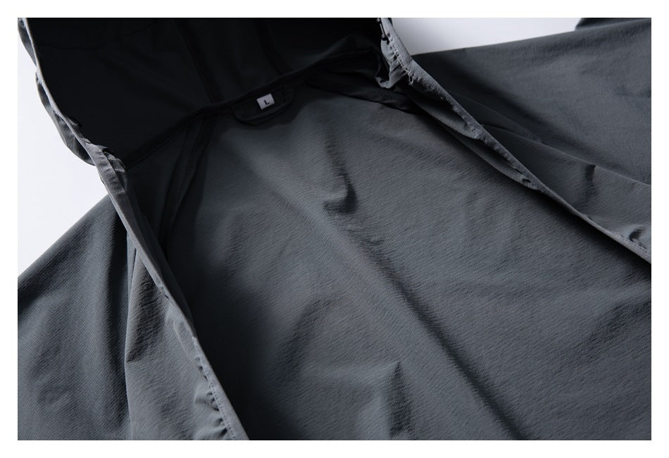 Close-up of the vest's interior fabric and seams, with a small size L label near the neckline.