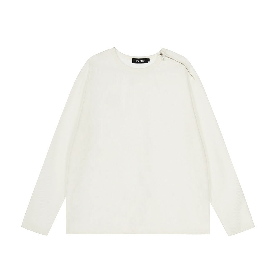 White long-sleeve crew-neck top with a textured knit surface and a silver zipper on the shoulder, front flat view