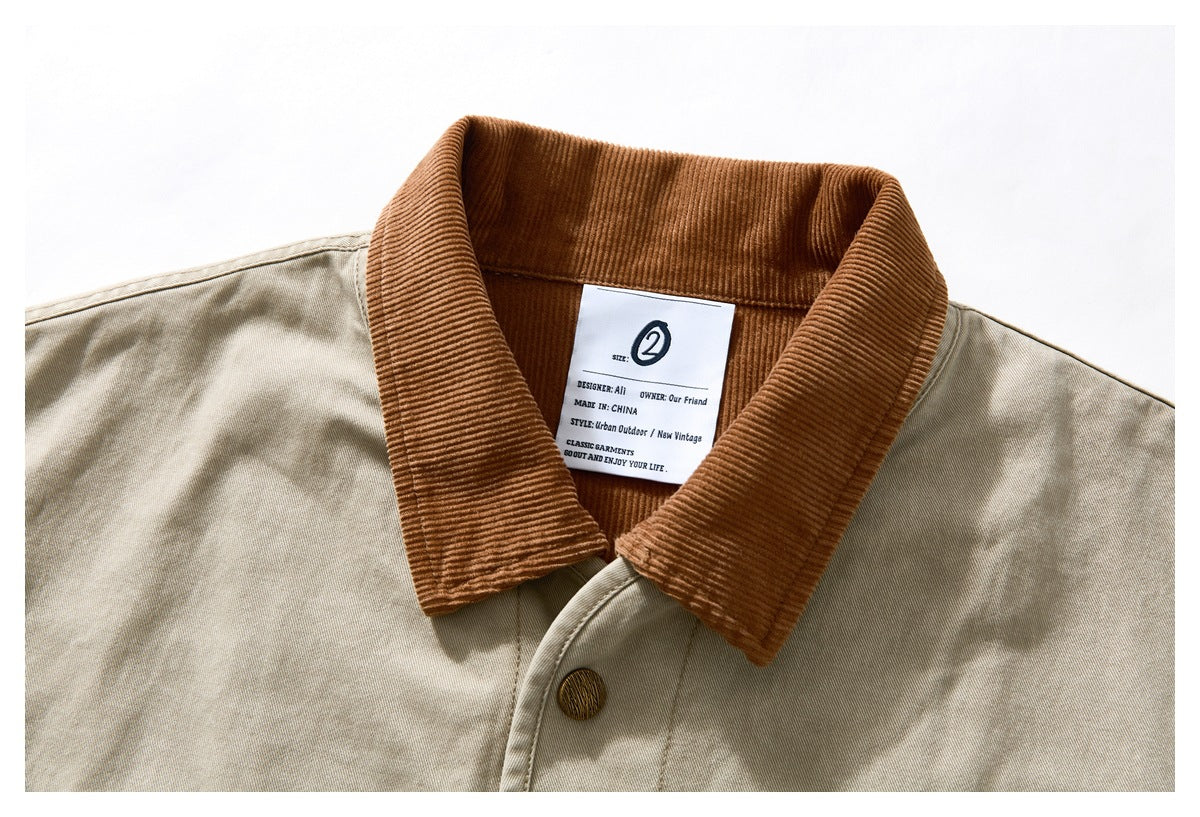Close-up of the beige jacket’s brown corduroy collar and sewn neck label.