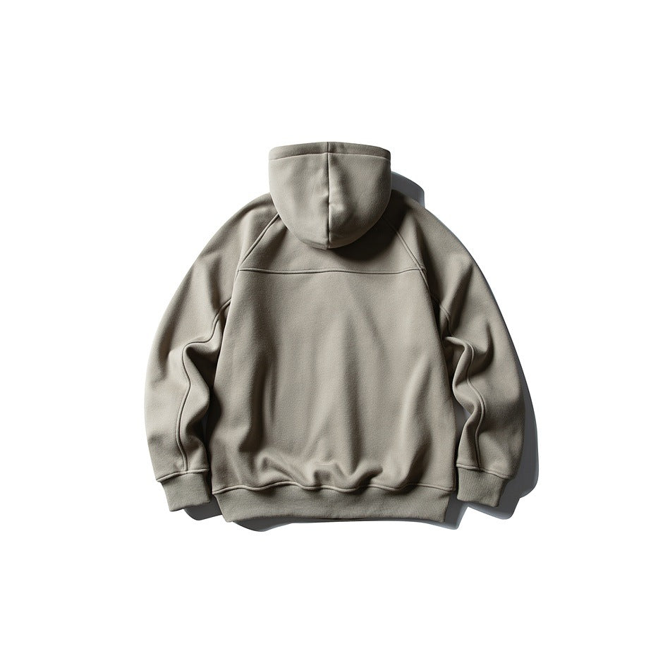 Back view of gray hooded sweatshirt flat lay showing hood, raglan sleeves, upper back seam and ribbed hem