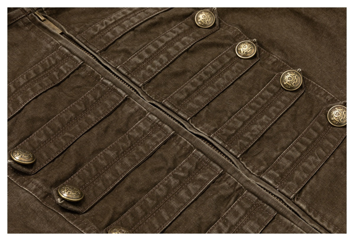 Close-up of a brown garment with rows of stitched tabs fastened by ornate brass-tone buttons.