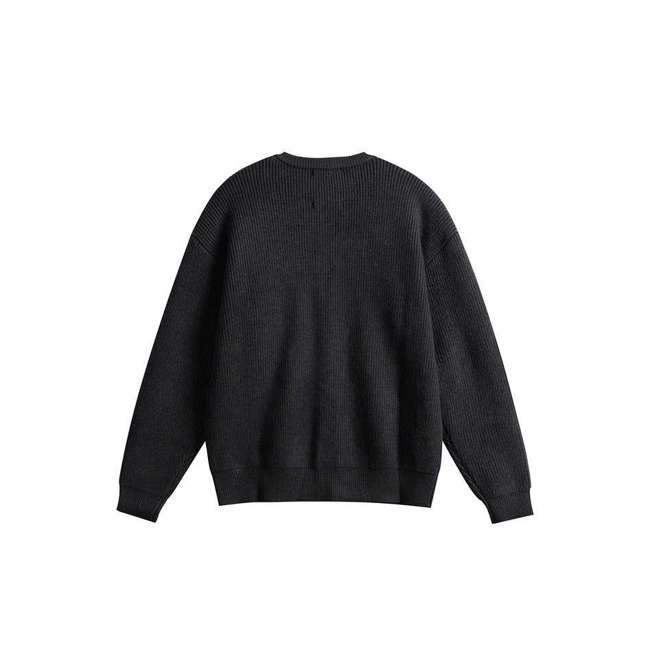 Back view of black ribbed knit cardigan with round neckline, dropped shoulders and ribbed cuffs