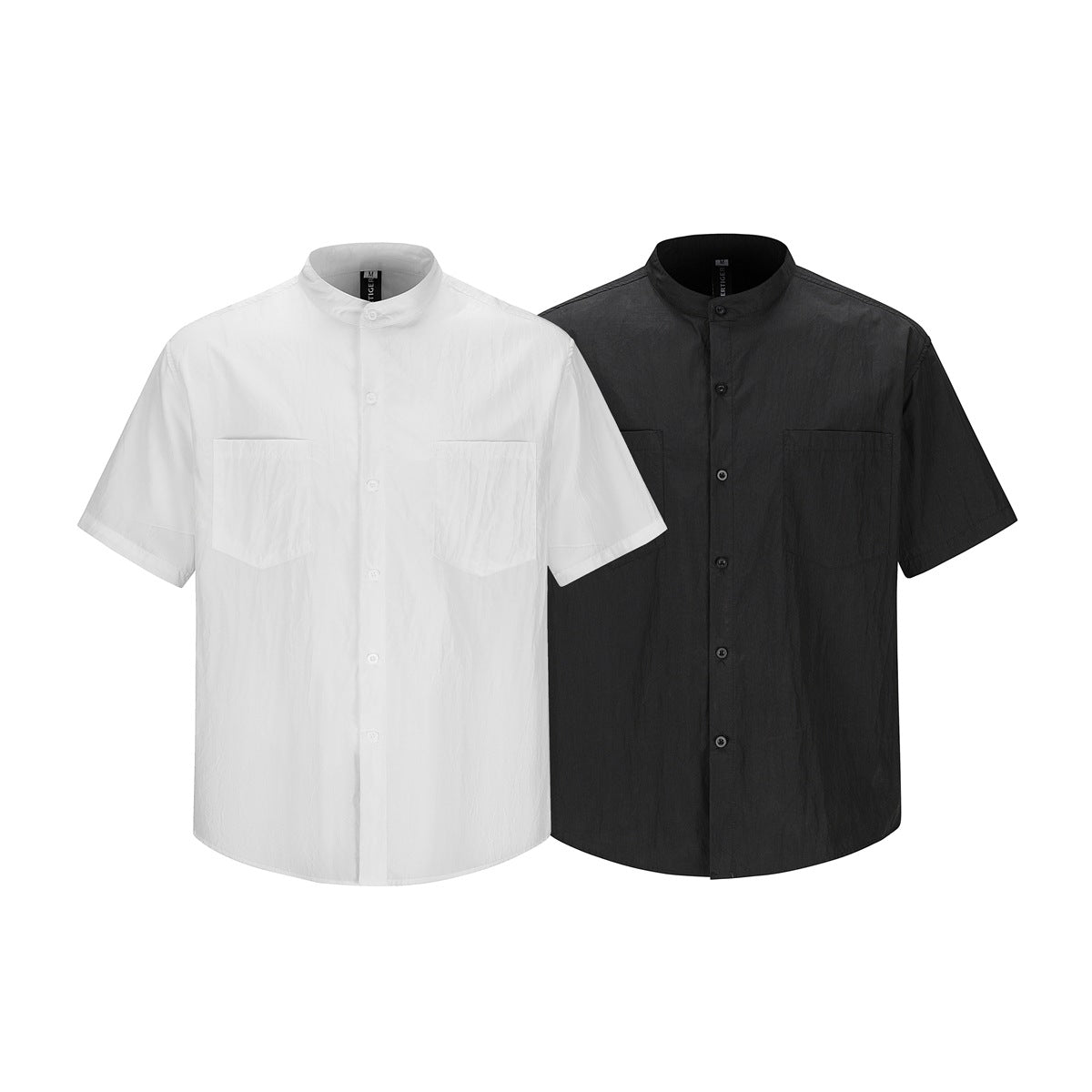 Front view of white and black short-sleeve shirts with stand collars, button fronts, and two chest pockets.