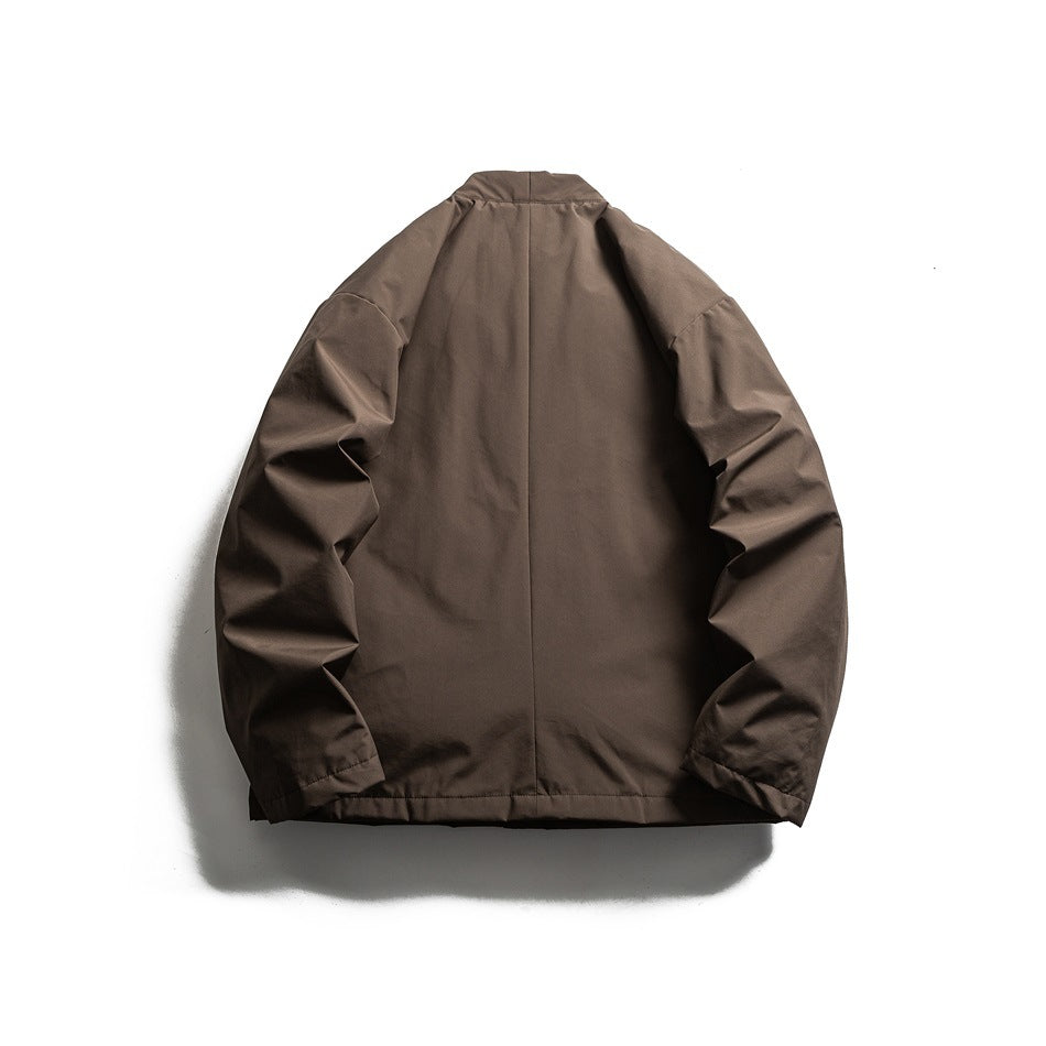 Plain brown jacket shown from the back, with a stand collar and long sleeves.