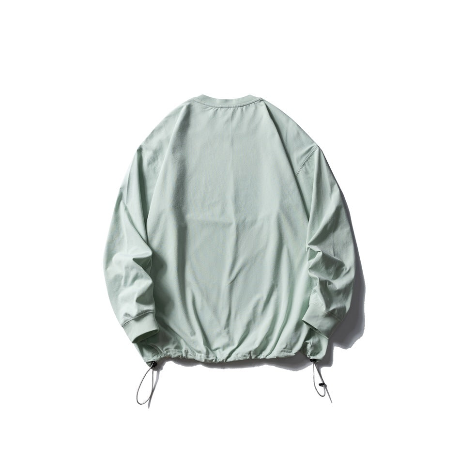 Back view of a pale mint long-sleeve crewneck pullover with ribbed cuffs and adjustable drawcords at the hem.