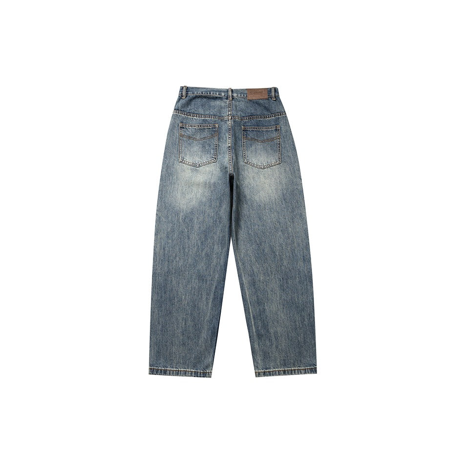 Back flat lay of washed blue denim jeans with two stitched patch pockets and a small waistband patch