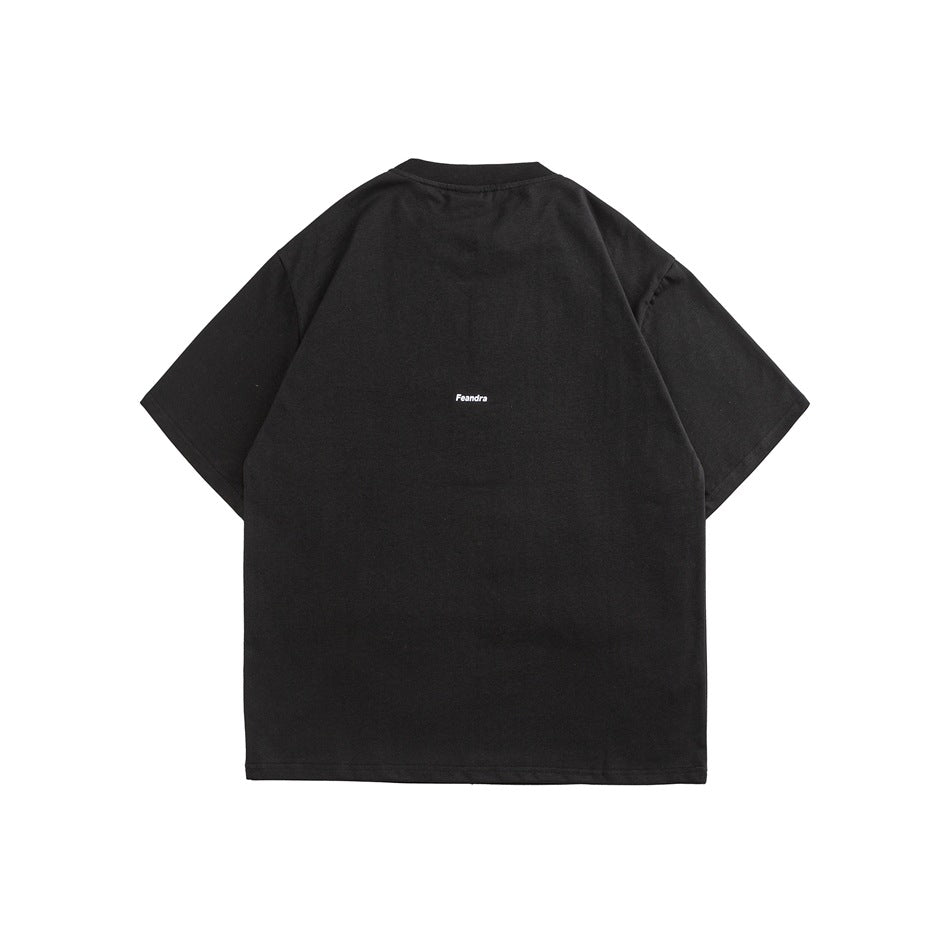 Back view of a black short-sleeve T-shirt with a small white print at the center.