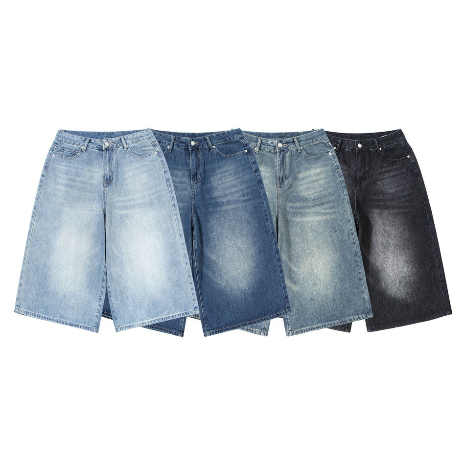 Four pairs of wide-leg denim shorts arranged together in light blue, dark blue, faded blue, and black washes.