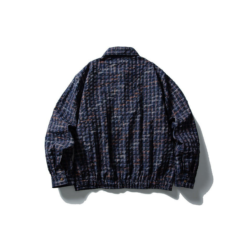 Back view of a navy plaid jacket displayed against a plain white background.