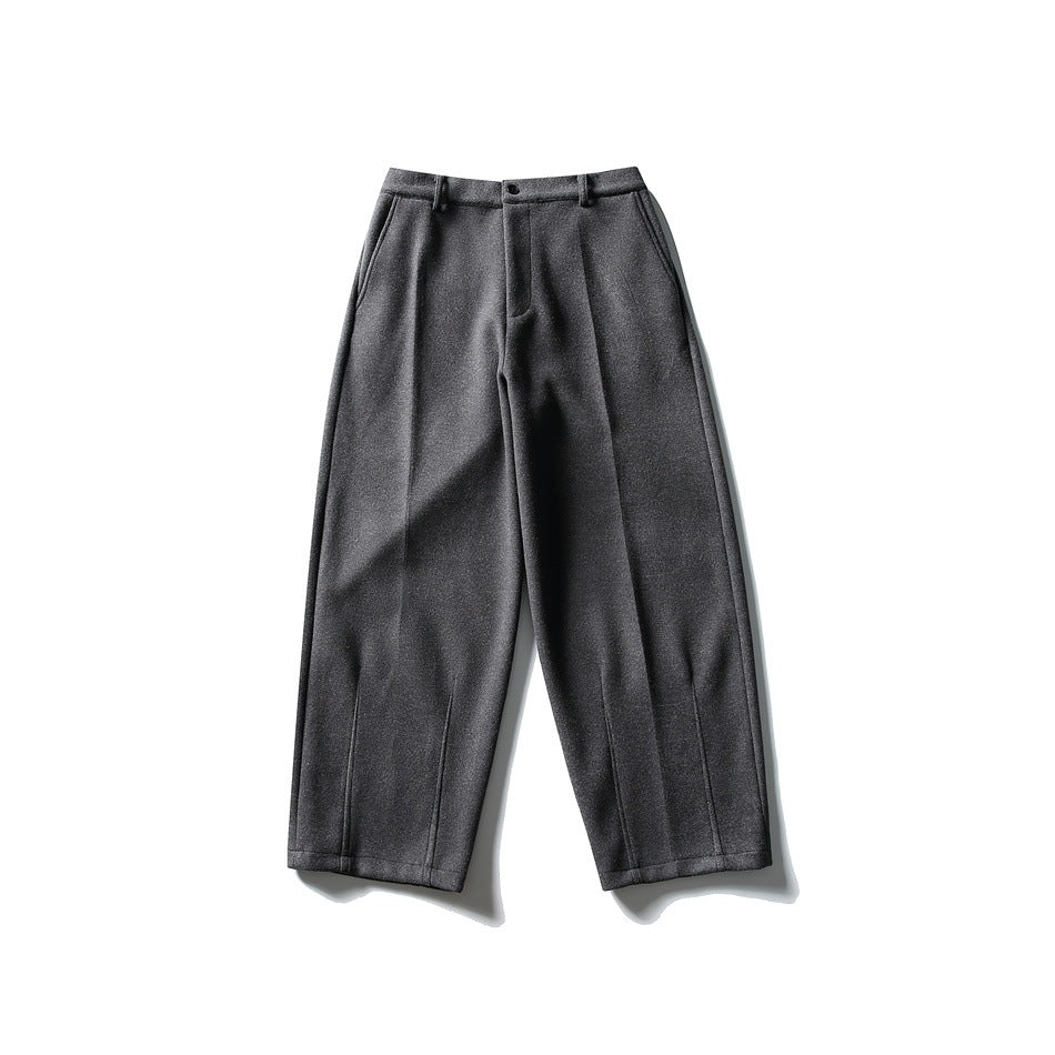 Dark gray wide-leg trousers flat lay, front view, with button fly, belt loops and pressed creases