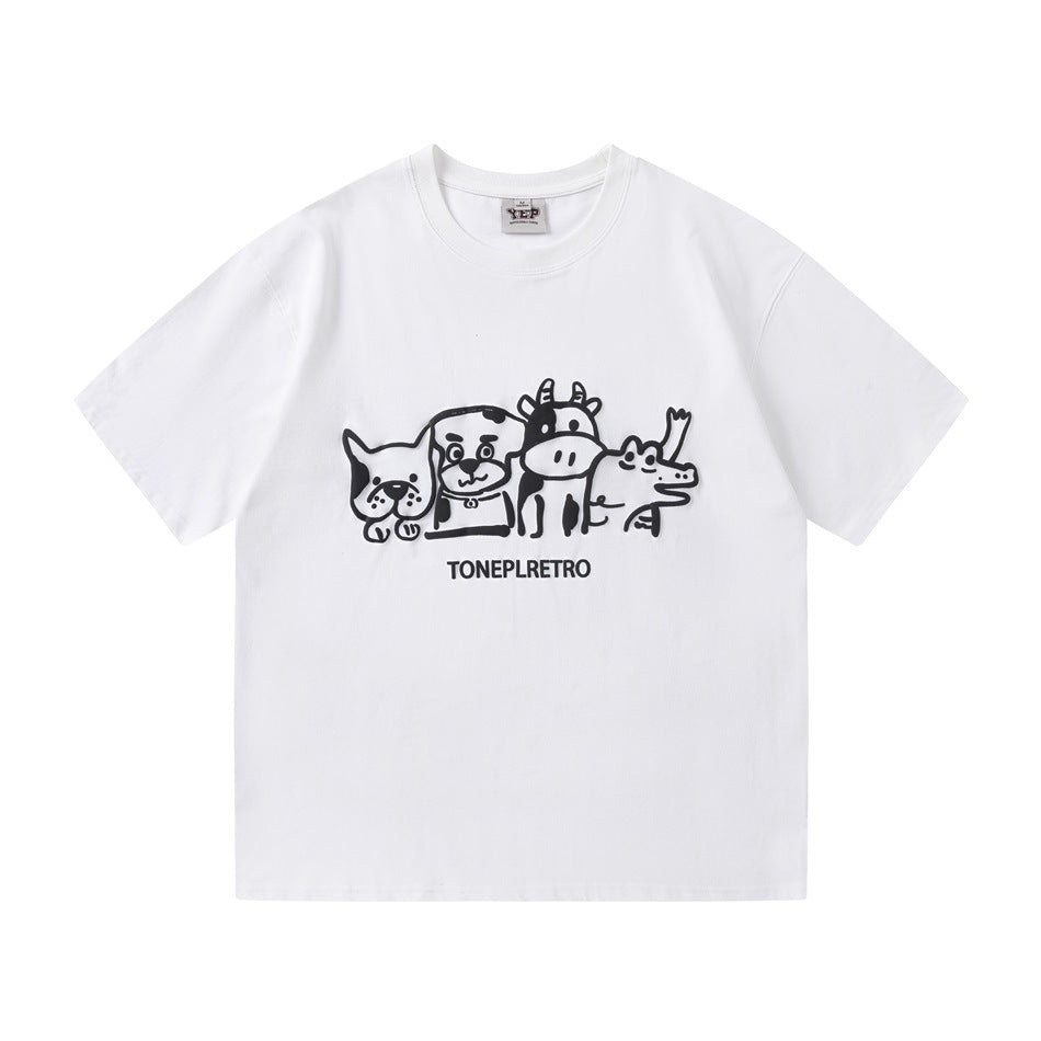 White short-sleeve crew neck T-shirt with black cartoon dog, cow and crocodile print and TONEPLRETRO text