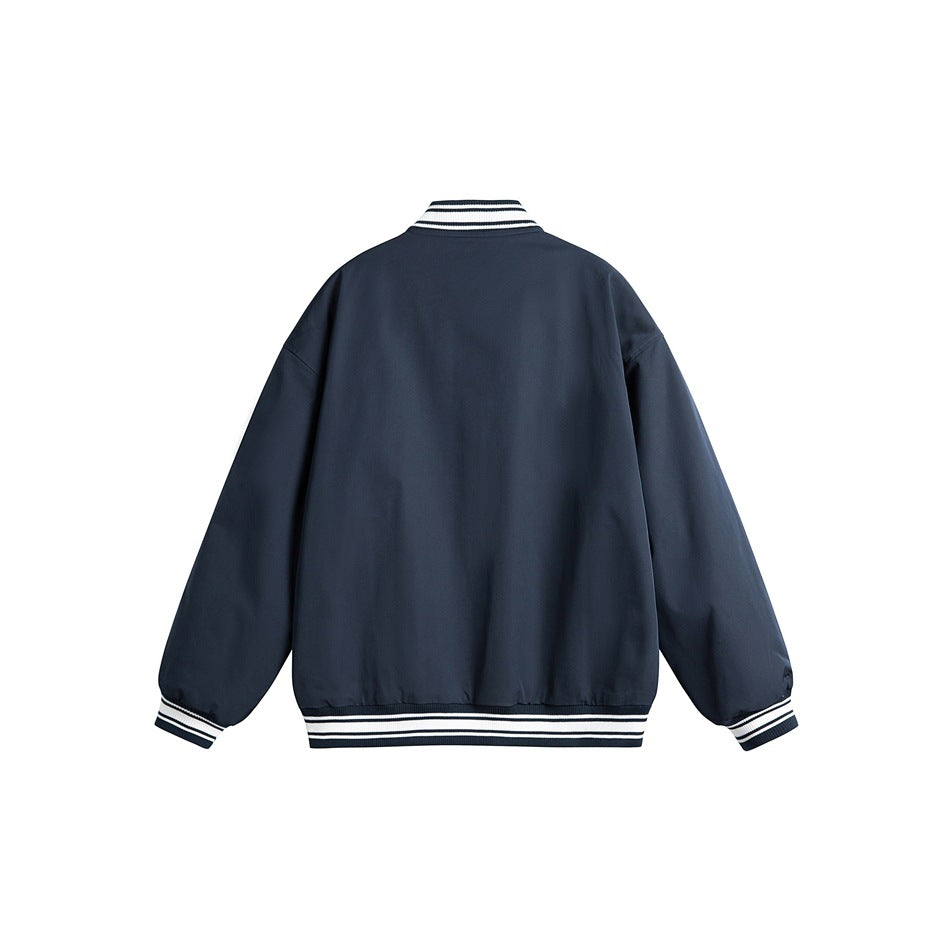 Back view of a plain navy varsity jacket with striped rib-knit collar, cuffs, and hem.
