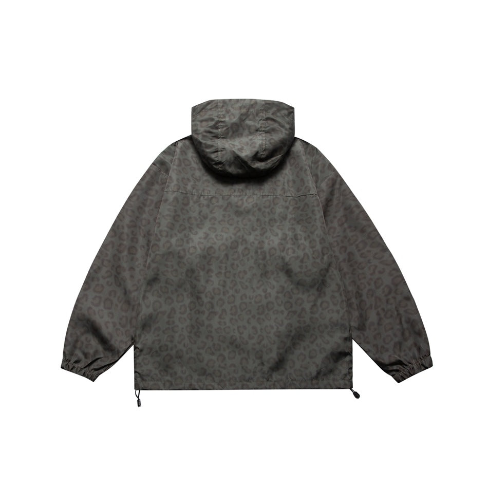 Back view of olive-gray hooded jacket with leopard print, back yoke seam, elastic cuffs and hem toggles