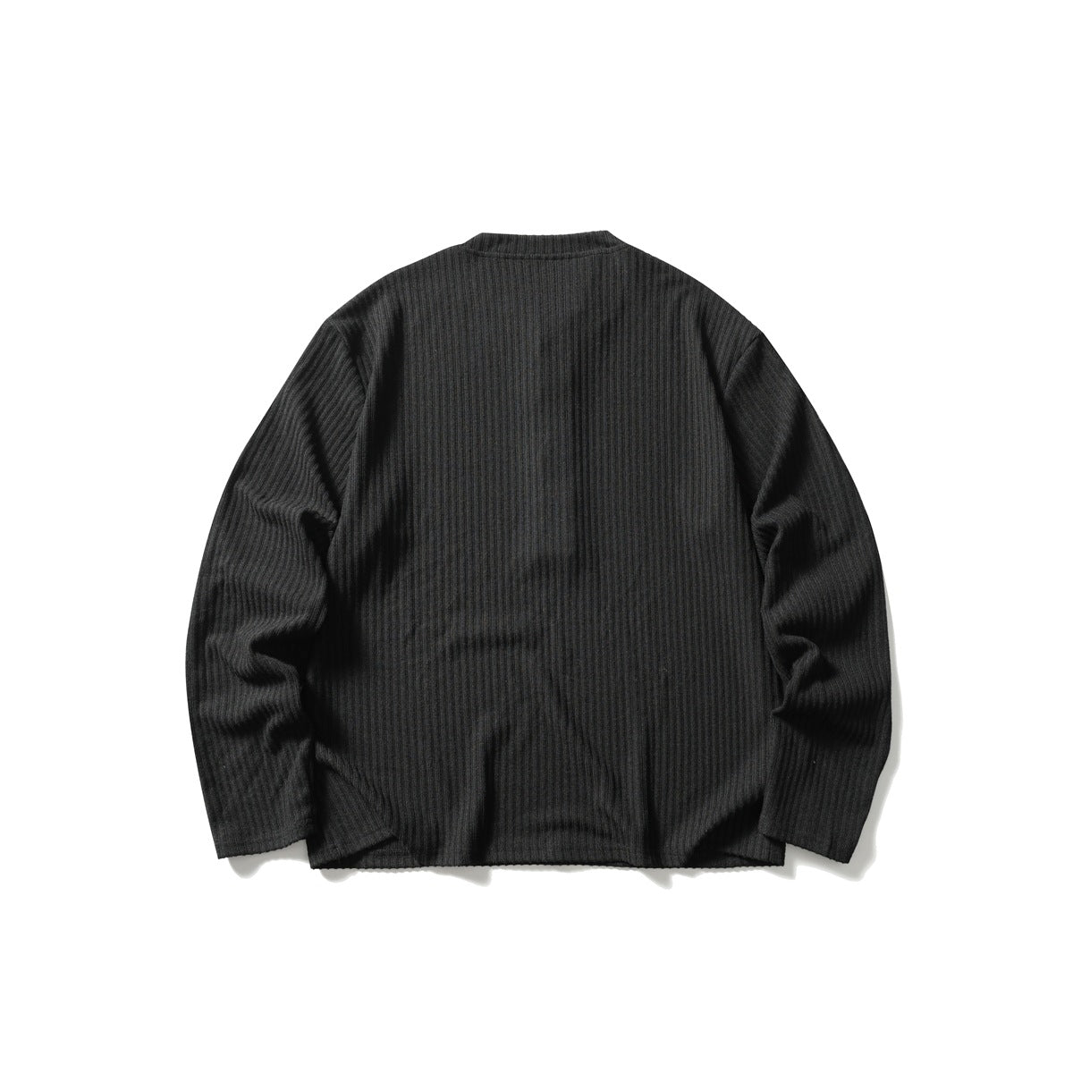 Back view of a black long-sleeve ribbed shirt laid flat against a white background.