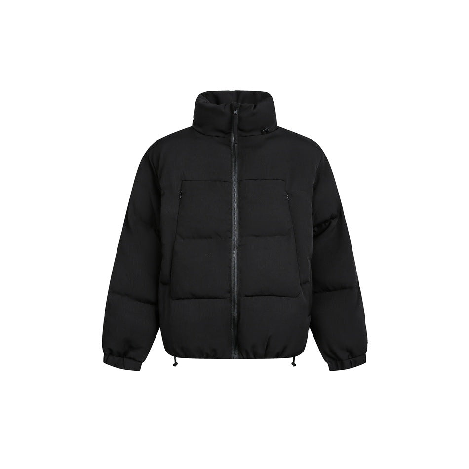 Black puffer jacket with stand collar, front zipper, zippered chest pockets, elastic cuffs and drawcord hem, front view