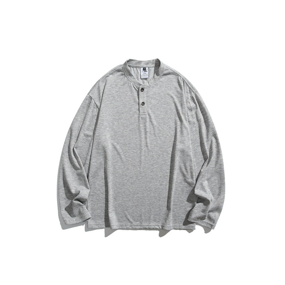 Gray heathered long-sleeve henley top with stand collar and two buttons, flat lay front view