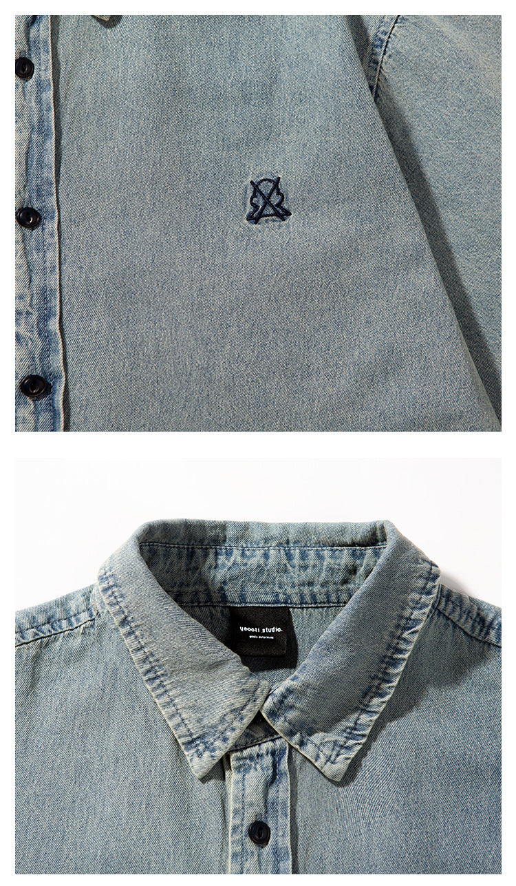 Close-ups of a light blue denim shirt's embroidered emblem, collar, and black brand label.
