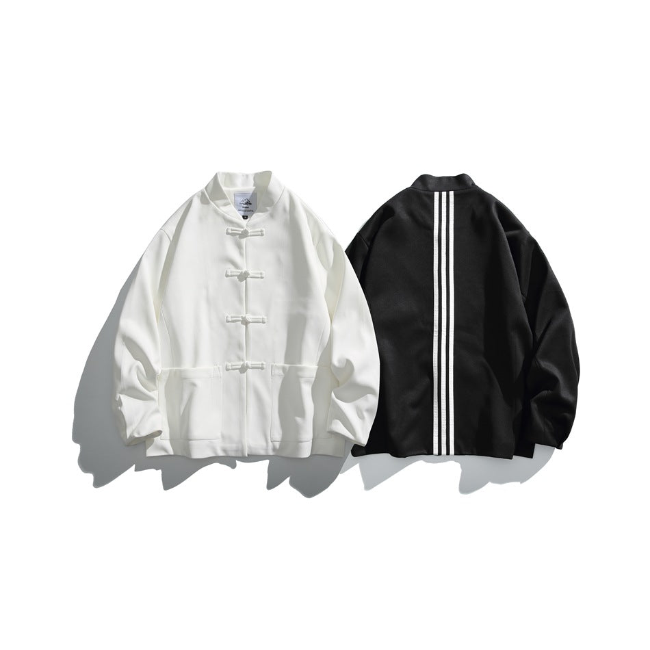 White jacket shown from the front and black jacket shown from the back, both with frog closures and vertical stripes.