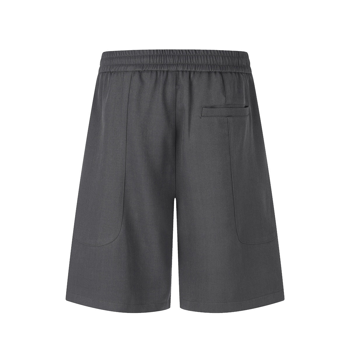 Back view of dark gray knee-length shorts with elastic waistband, welt back pocket and curved panel seams