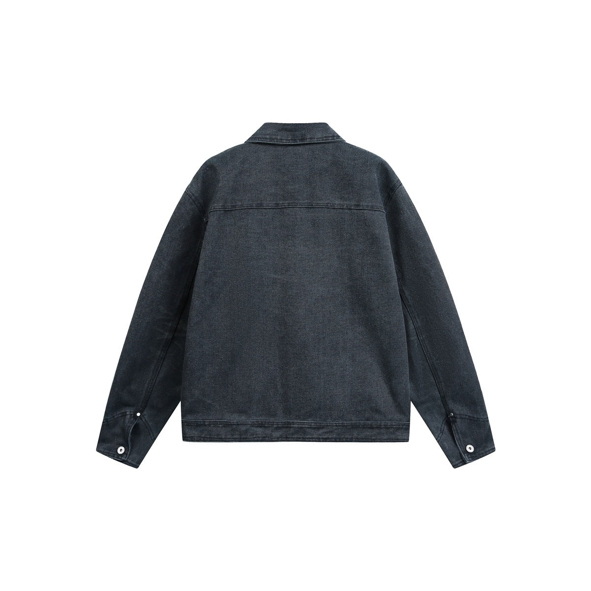 Back view of a dark indigo jacket with a horizontal back yoke, long sleeves, and buttoned cuffs.