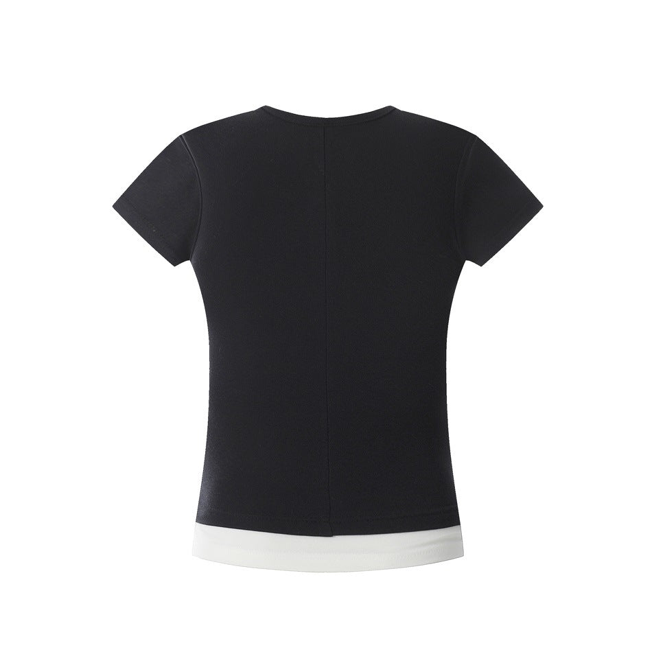 Back view of a black short-sleeve top with a white contrast hem band, shown flat against a white background.