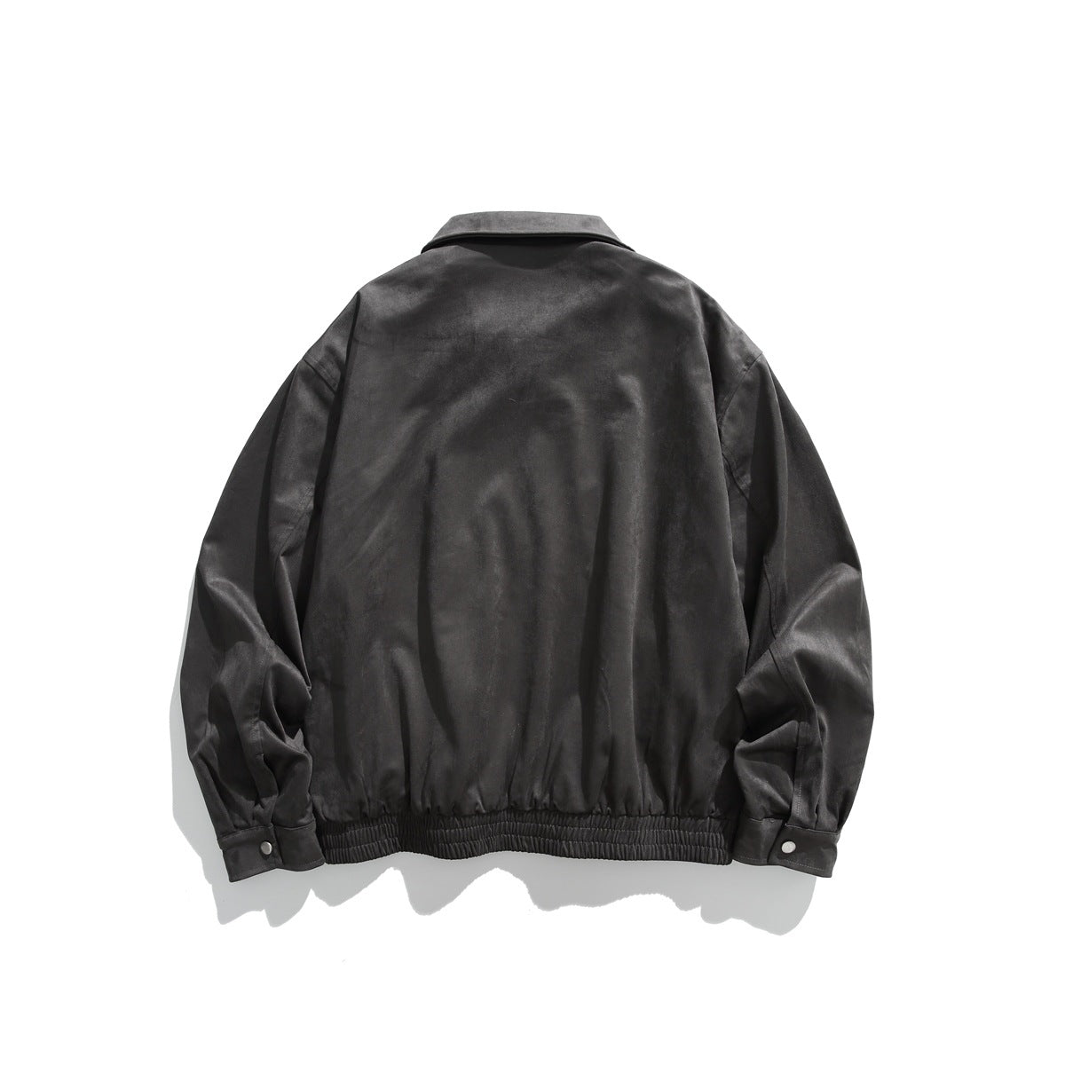 Back view of a charcoal gray jacket with a pointed collar, gathered hem, and buttoned cuffs.