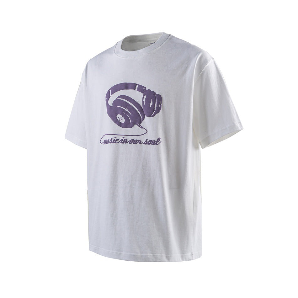 White short-sleeve T-shirt with a purple headphone graphic and “Music in our soul” text on the chest.