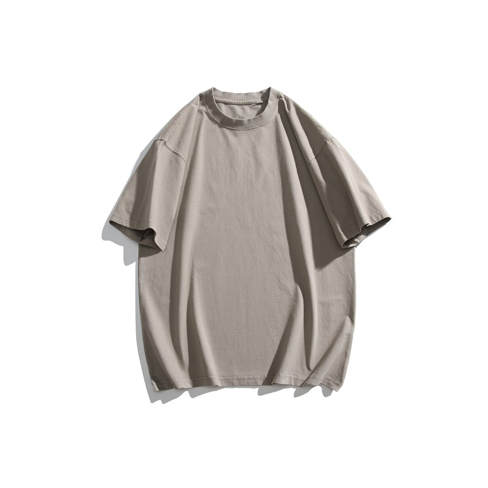 Khaki taupe short-sleeve crew neck T-shirt with dropped shoulders, flat lay on a white background