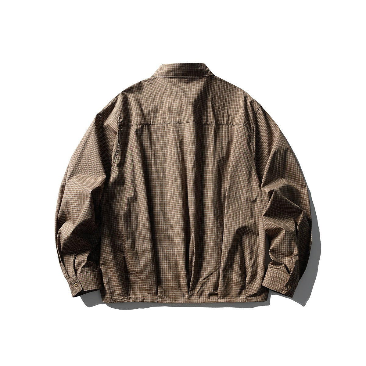 Back view of brown-green micro-check long-sleeve shirt showing back yoke seam and lower pleat