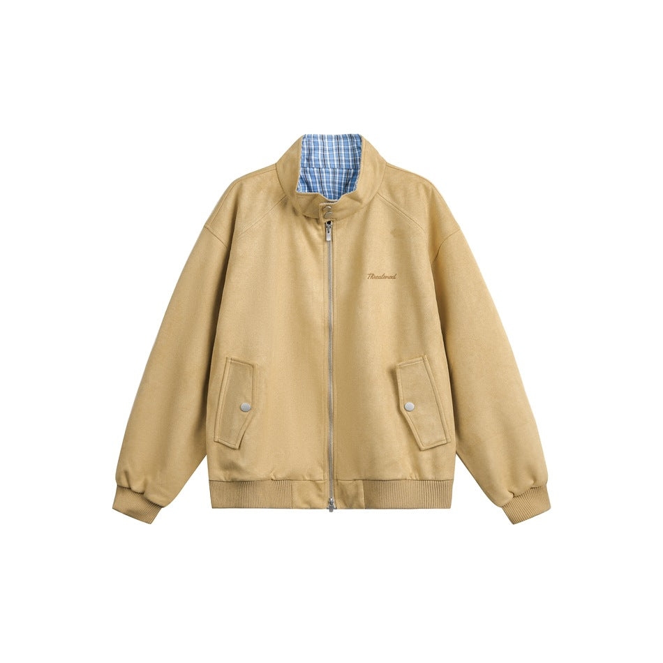 Khaki stand-collar zip jacket with blue plaid collar lining, snap flap pockets and ribbed hem, flat front view