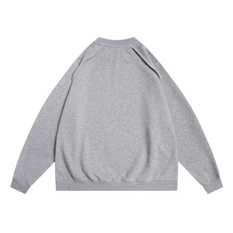 Back view of a plain gray raglan crewneck sweatshirt laid flat on a white background.