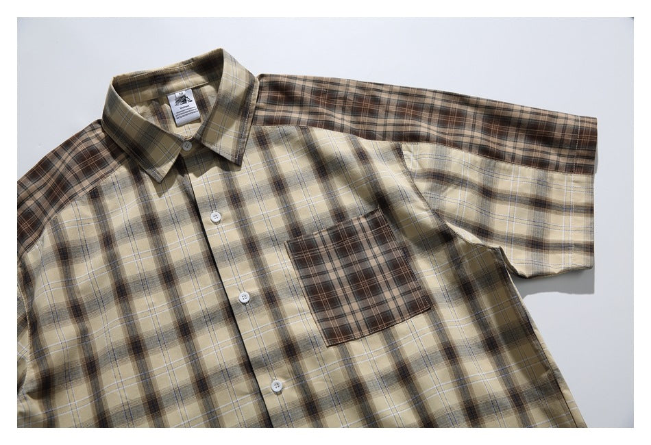 Tan plaid short-sleeve button-up shirt laid flat, with a contrasting brown plaid chest pocket.