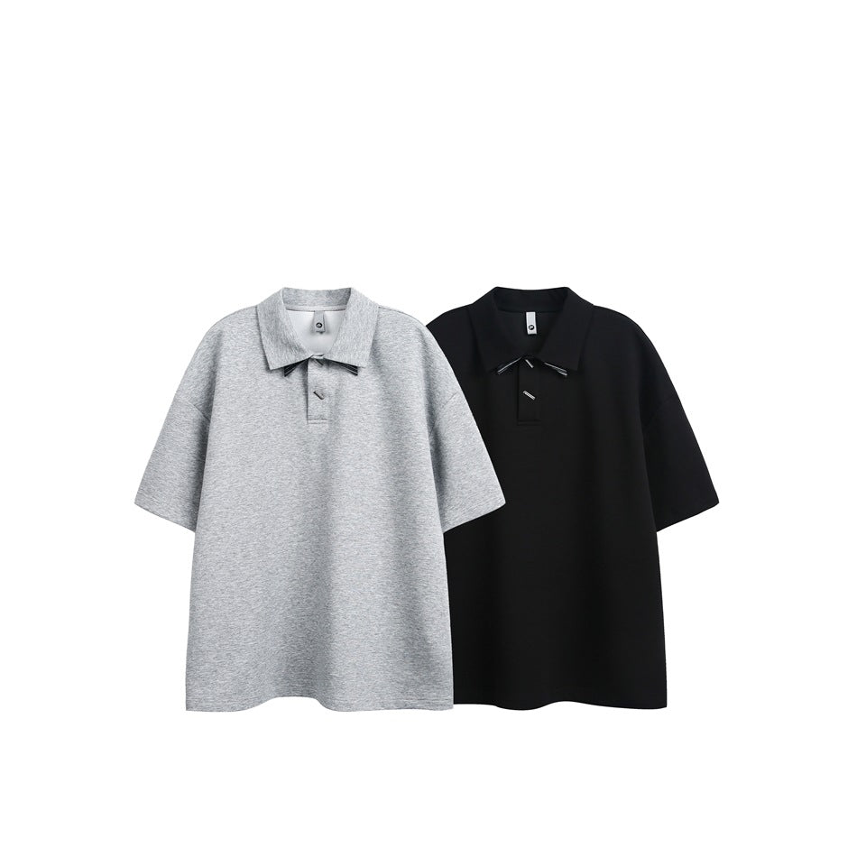 Two short-sleeve collared polos displayed side by side in heather gray and black.