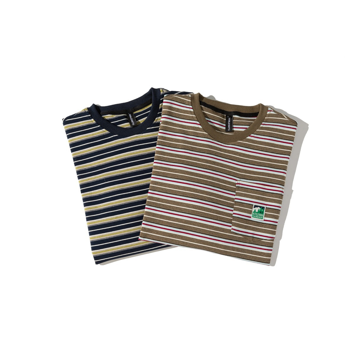 Two folded striped crew-neck T-shirts in navy with yellow accents and brown with red accents.